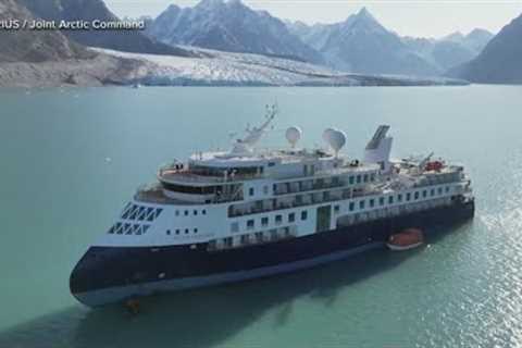 Stranded luxury cruise ship MV Ocean Explorer pulled free at high tide in Greenland
